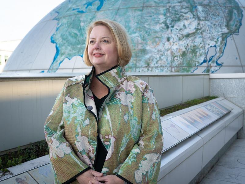 Dr. Denise Young, Director, NC Museum of Natural Sciences, on the 3rd floor bridge overlooking the SECU Daily Planet.